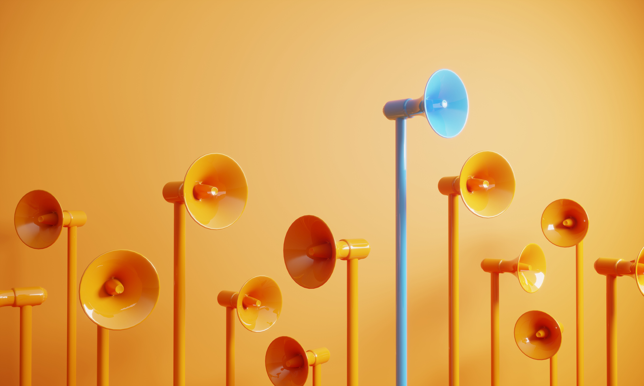 Blue megaphones transmit a message above the shorter orange megaphones.